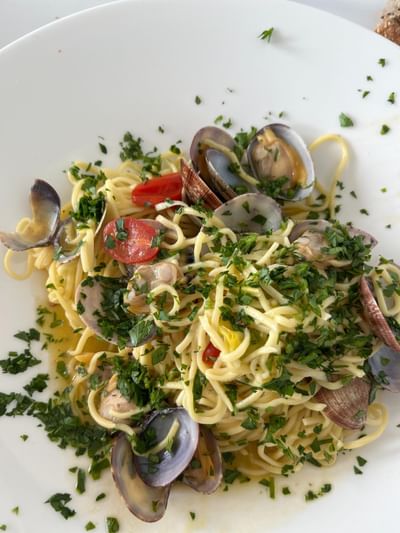 Plate of linguine pasta served in Osteria 31, one of the best restaurants in Lausanne at Starling Hotel Lausanne