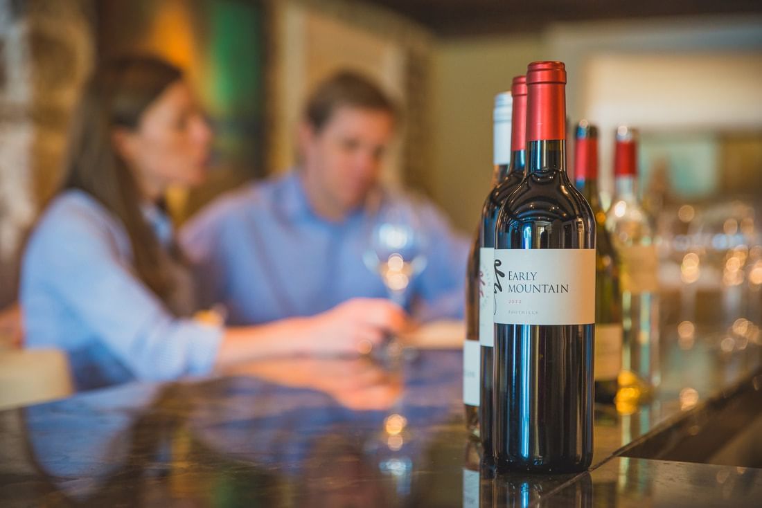 Close-up of wine bottle on a counter with a blurry background at Inn at Willow grove