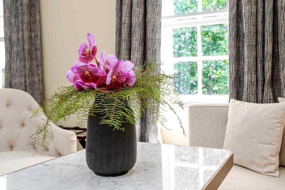 A Flowerpot on a table in Courtyard Double at The Relais Henley