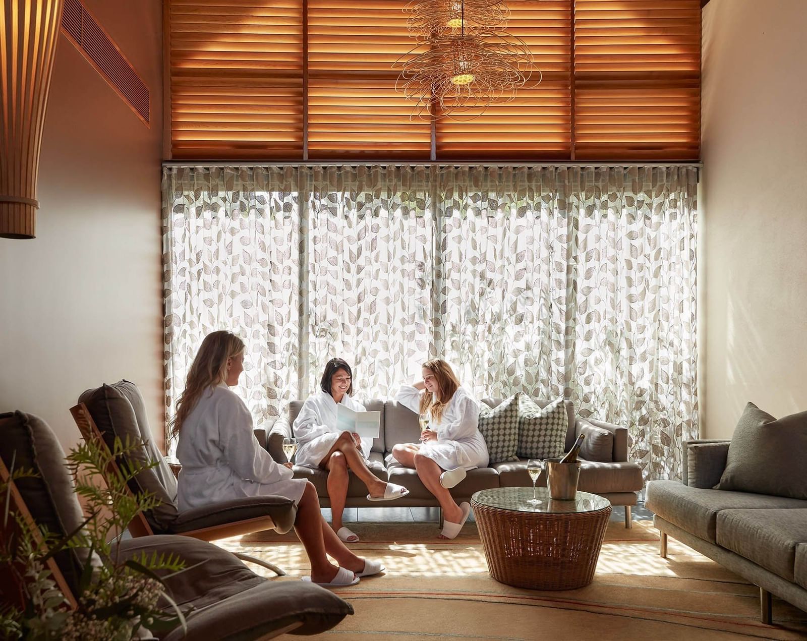 Interior of a spa lobby with sofa at Pullman Bunker Bay Resort
