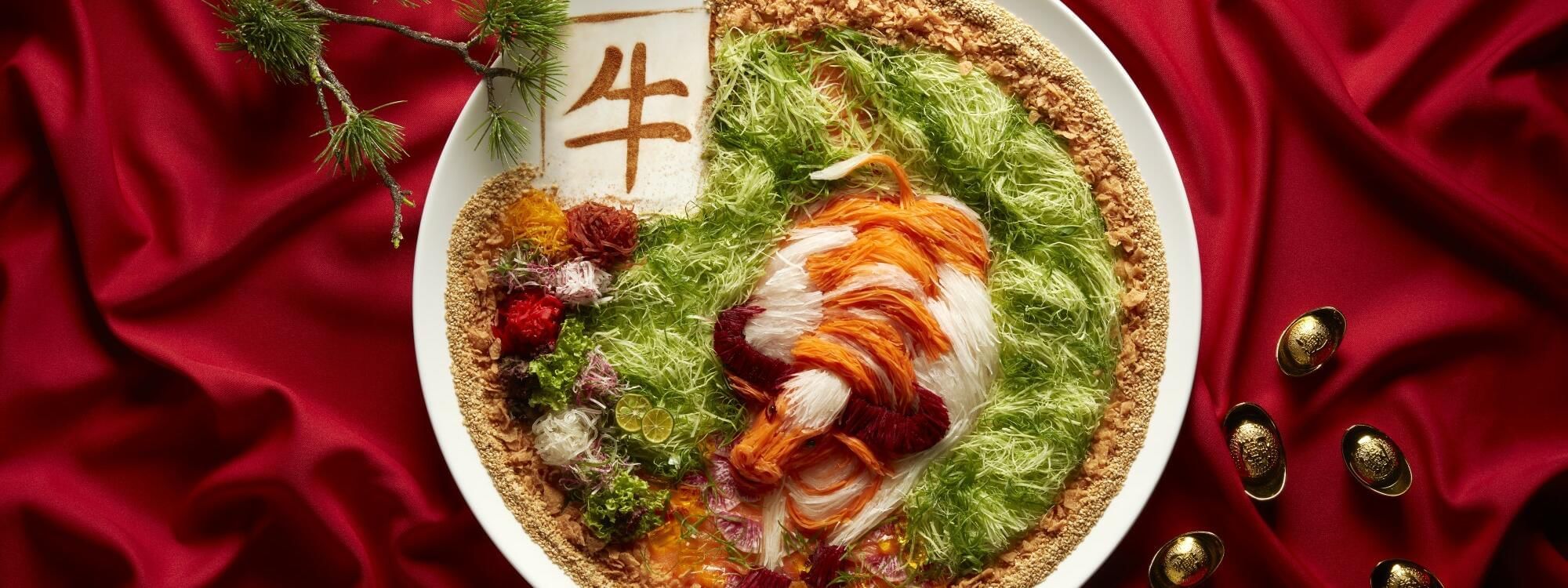 Close-up of Yusheng dish served at Fullerton Singapore