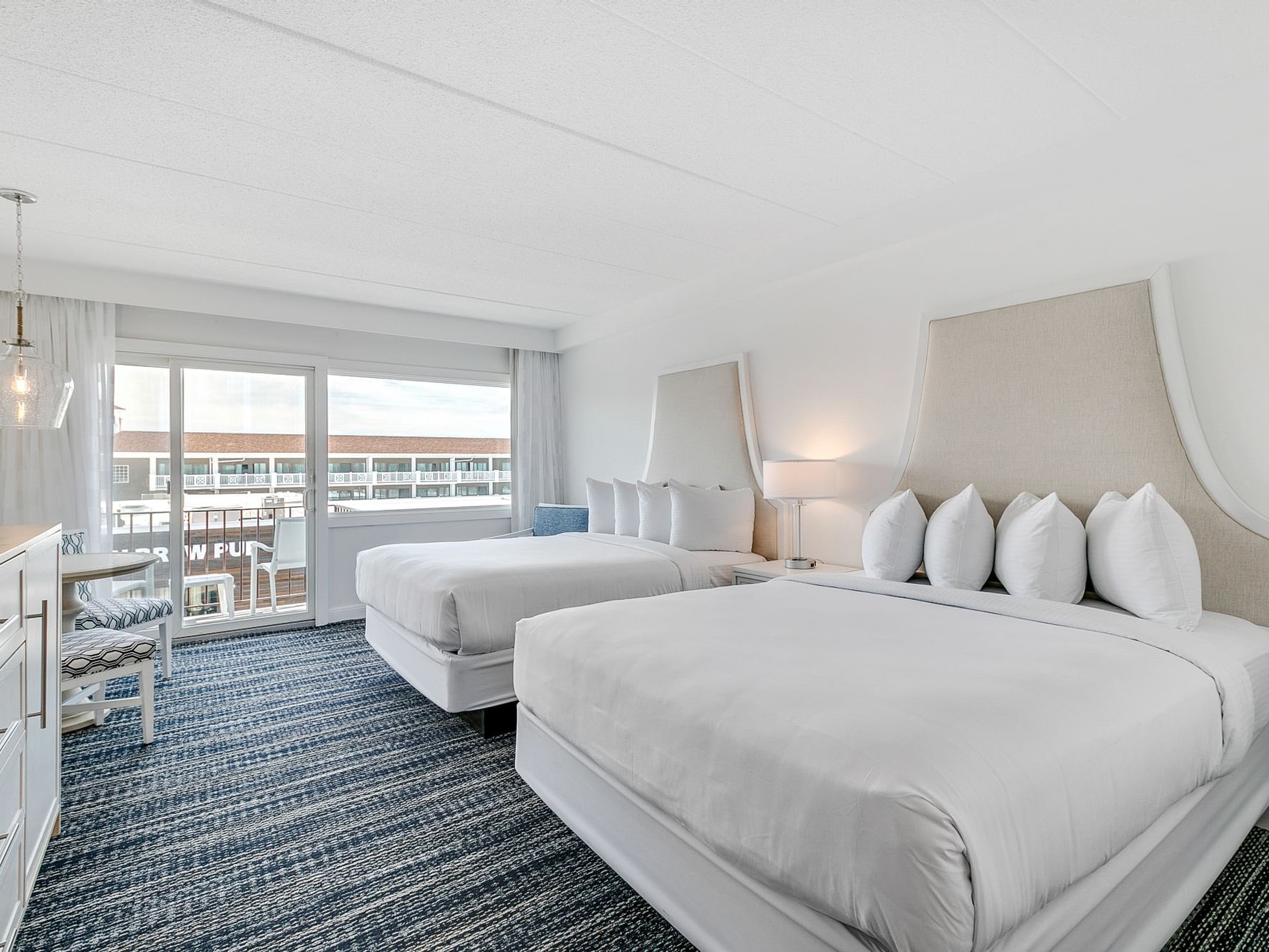 Signature Queen Hotel Room in Avalon NJ with Keurig, and wall mounted TV