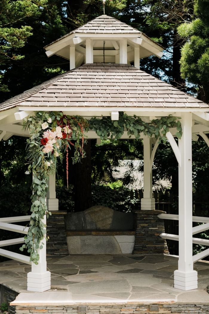 Charming Gazebo featuring flower garland by Cambria Nursery and Florist