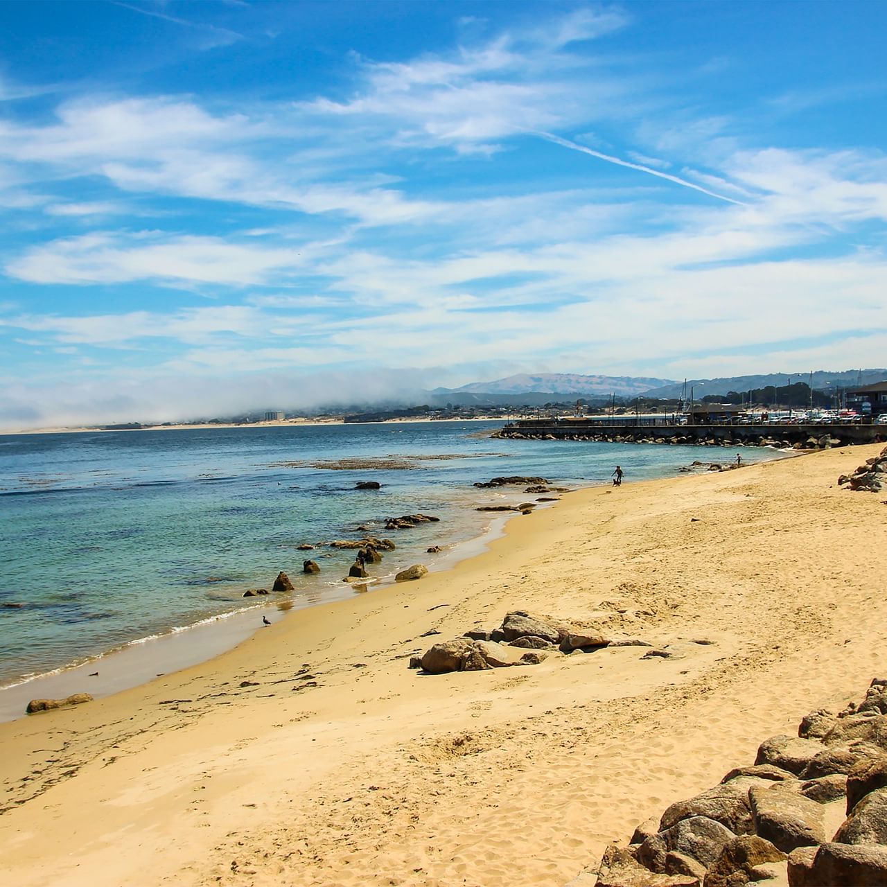 A beautiful photo of a Monterey beach on a sunny day