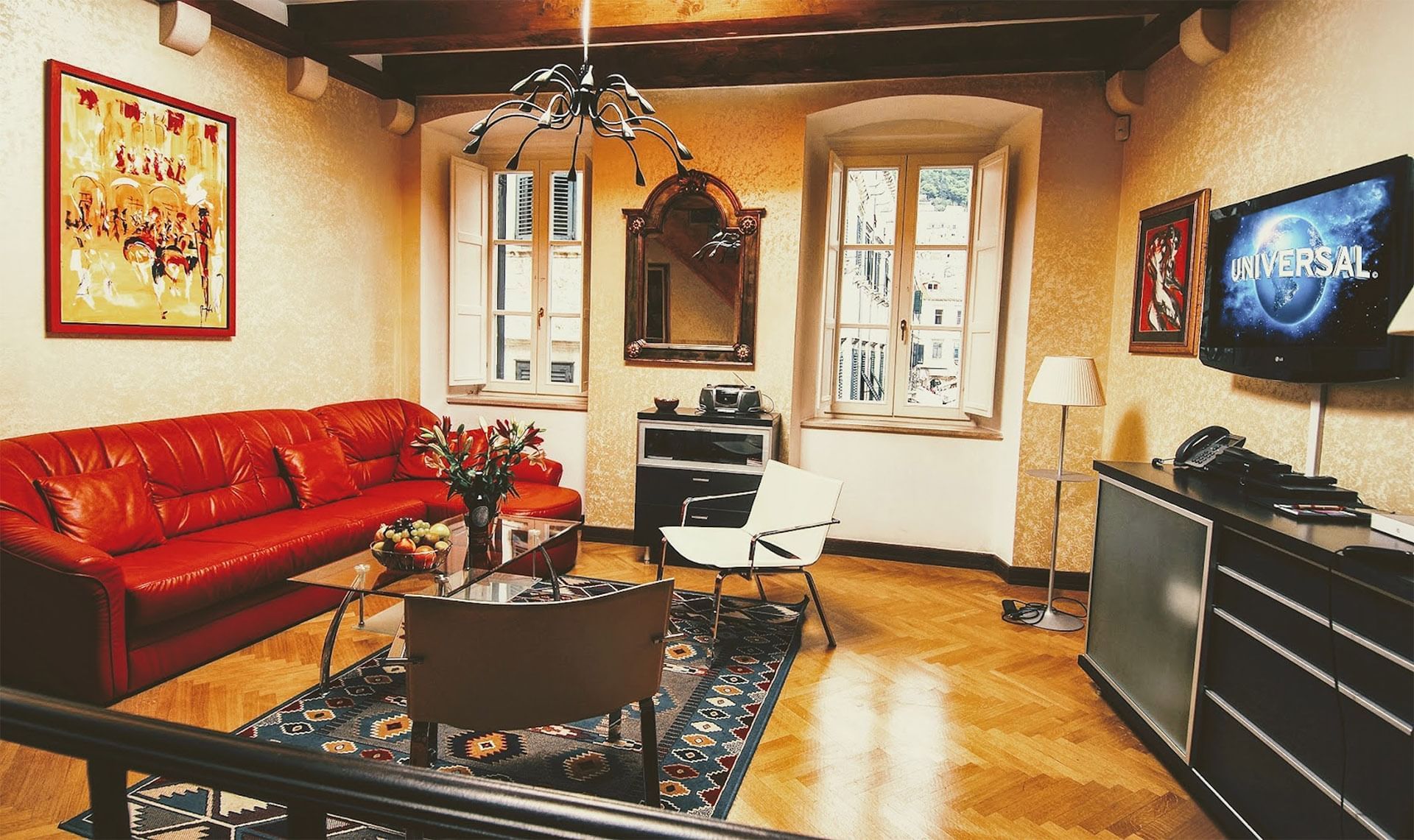 Lounge area with a Tv at Pervanovo Celenga Apartments