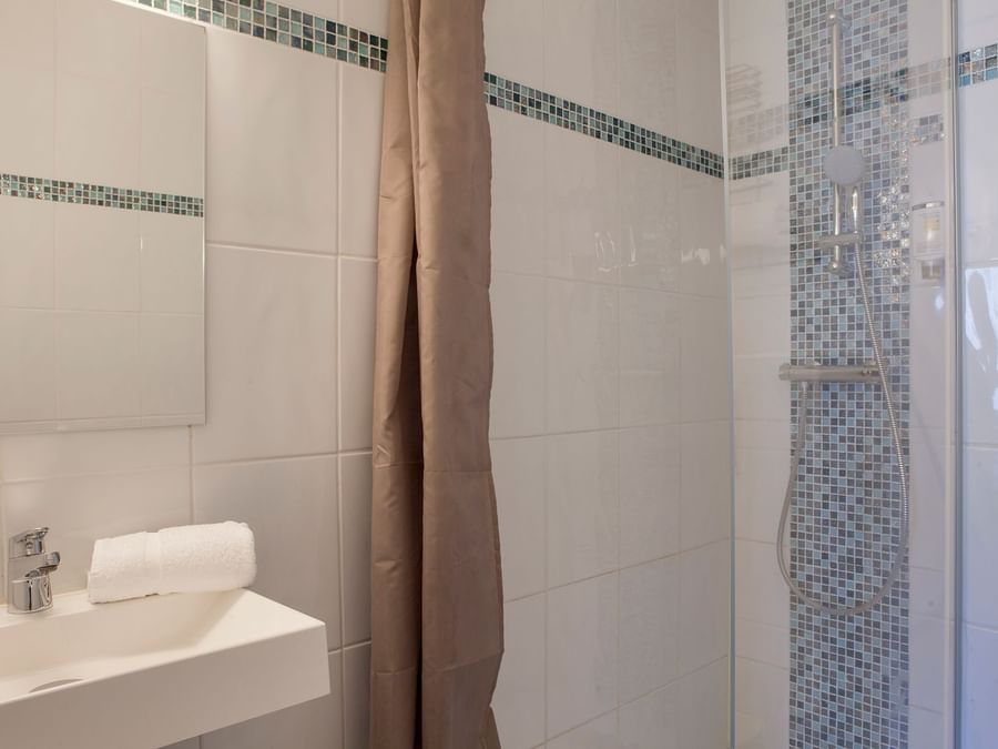 Bathroom vanity in bedrooms at Hotel Novella