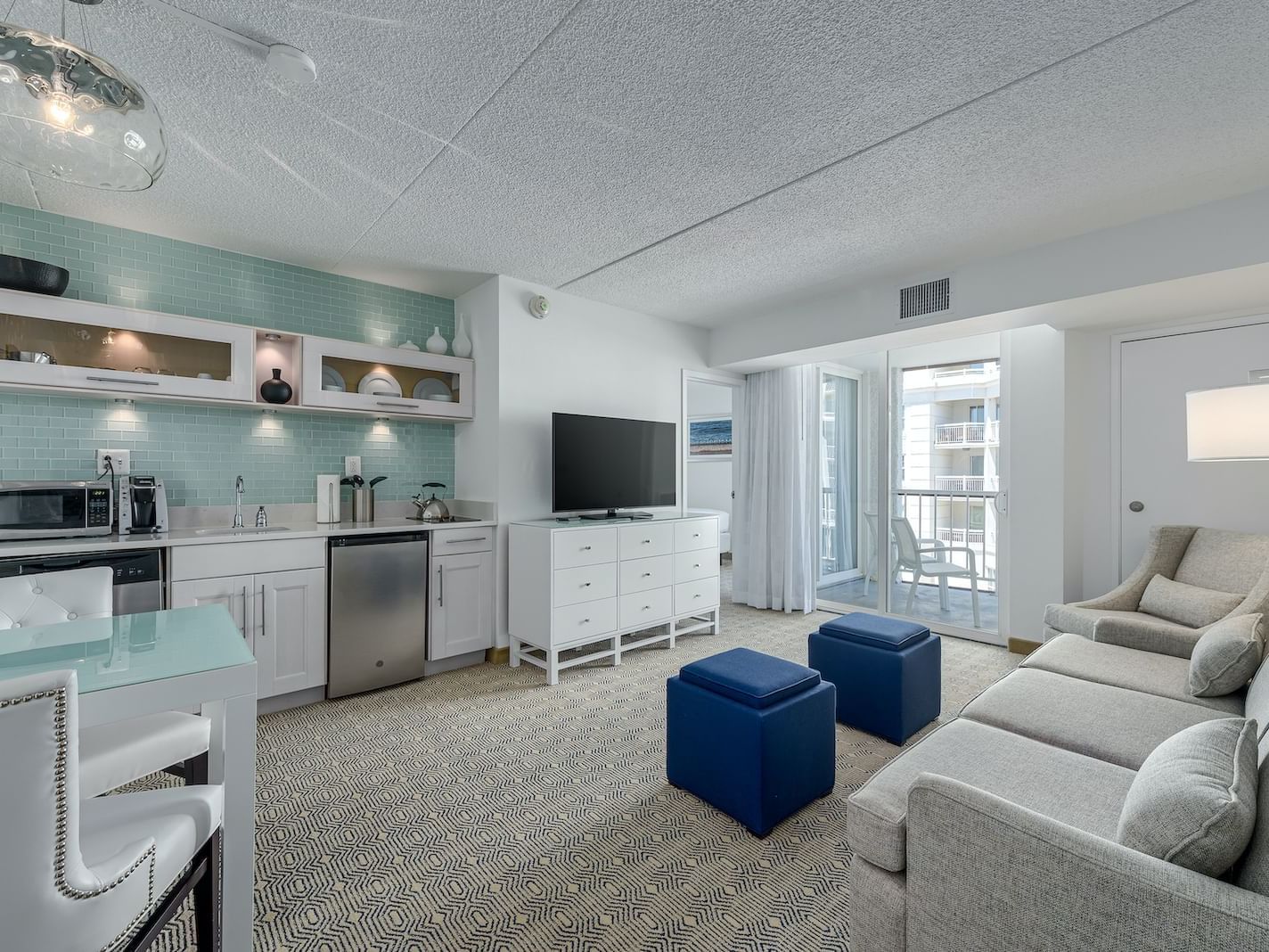 Kitchen & living areas in Premium Double Suite at ICONA Diamond
