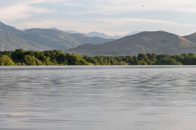 Lake surrounded by mountains view near Marea Beachfront Villas