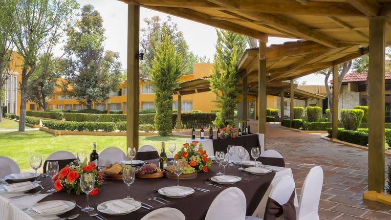 Close-up of a table set up for an event at Gamma Pachuca