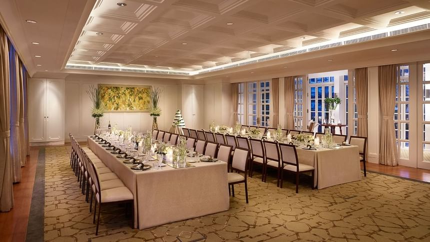Long table arrangements with carpeted floors and opened doors leading to the Foyer at Park Hyatt Saigon