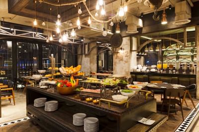Buffet station with & dining tables in a restaurant at Eastin Hotels