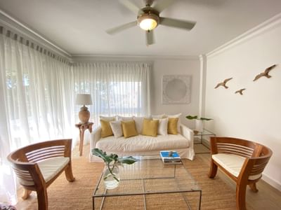 Living room with cozy sofa in a apartment at Club Hemingway