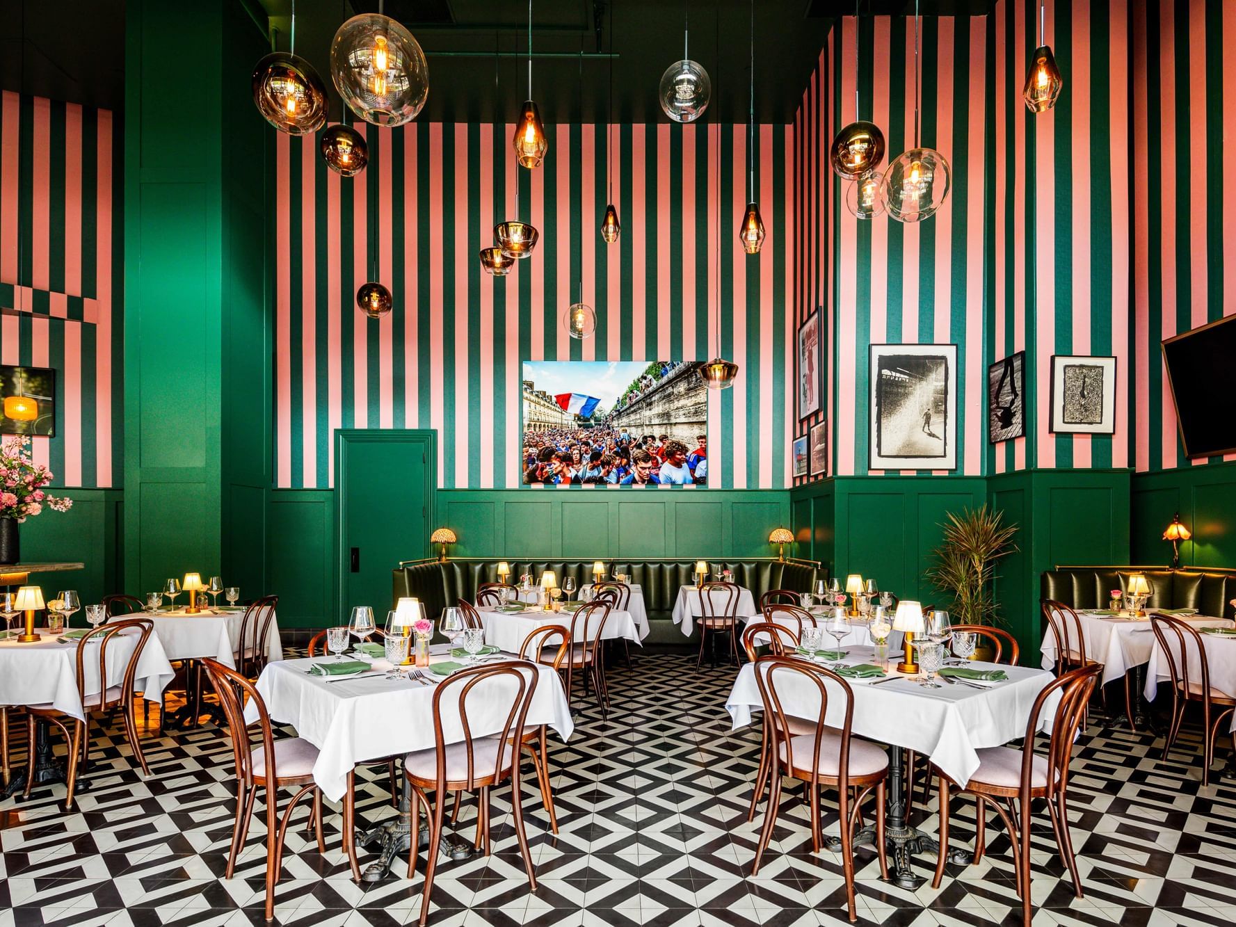 Dining room at Le Coin with tables and chairs set for dinner