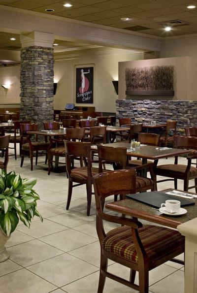 Dining area of THÊ Restaurant at Carriage House Hotel