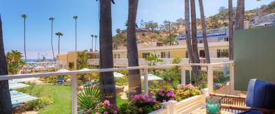 Balcony lounge area overlooking the sea & garden at Catalina Island Company