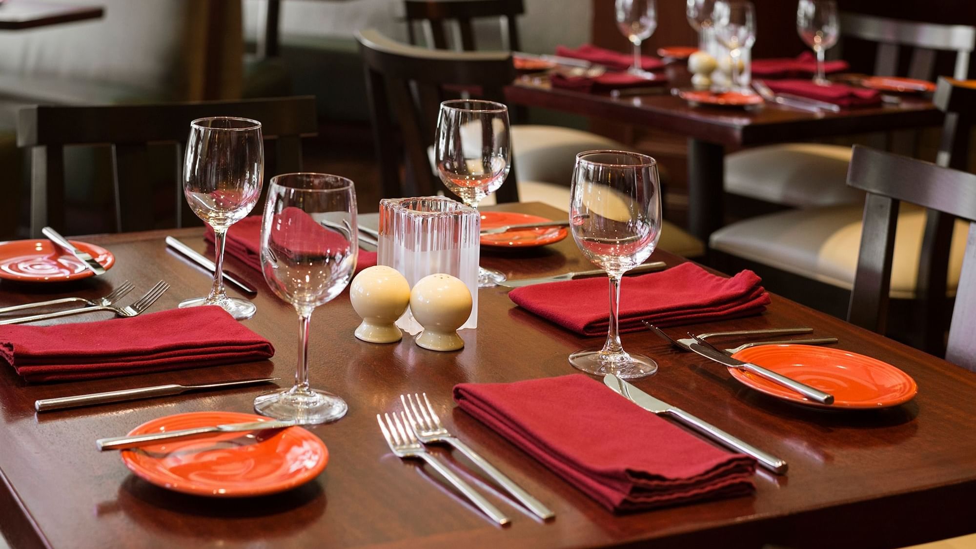 Table arranged with cutlery & glasses at Warwick Seattle
