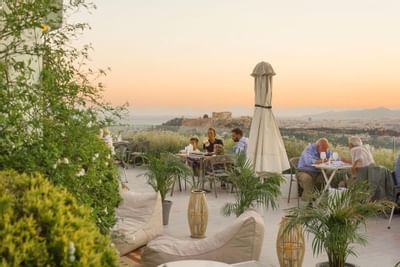People dining enjoying city view at St George Lycabettus