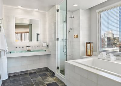 Luxury bathroom vanity & bathtub in Presidential Suite at Hotel Republic San Diego