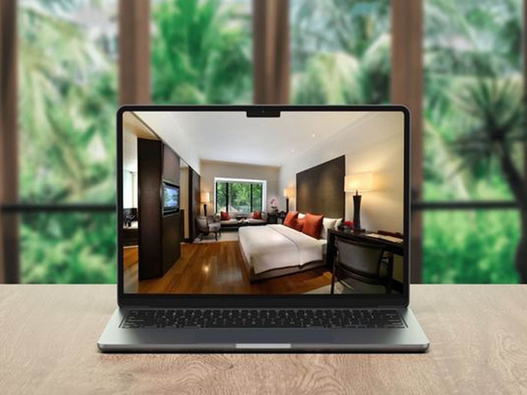 View of a hotel room image opened from a laptop on a table at Saujana Hotel Kuala Lumpur