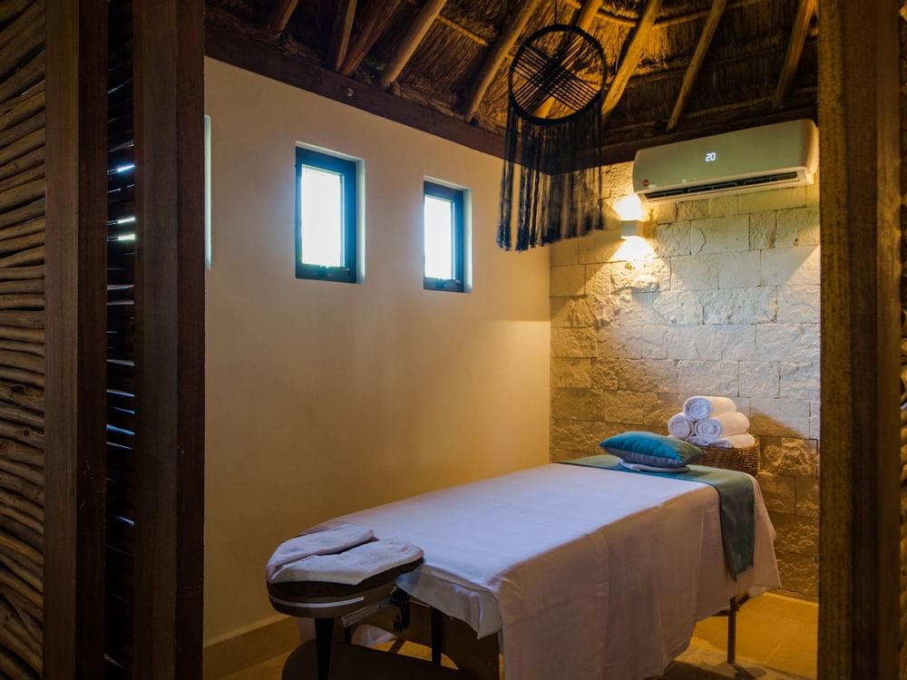 A Spa massage bed at Naay Tulum Curamoria Collection