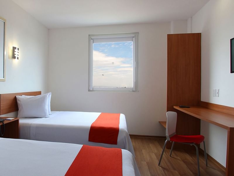 Interior de la habitación Doble Superior de One Hotels