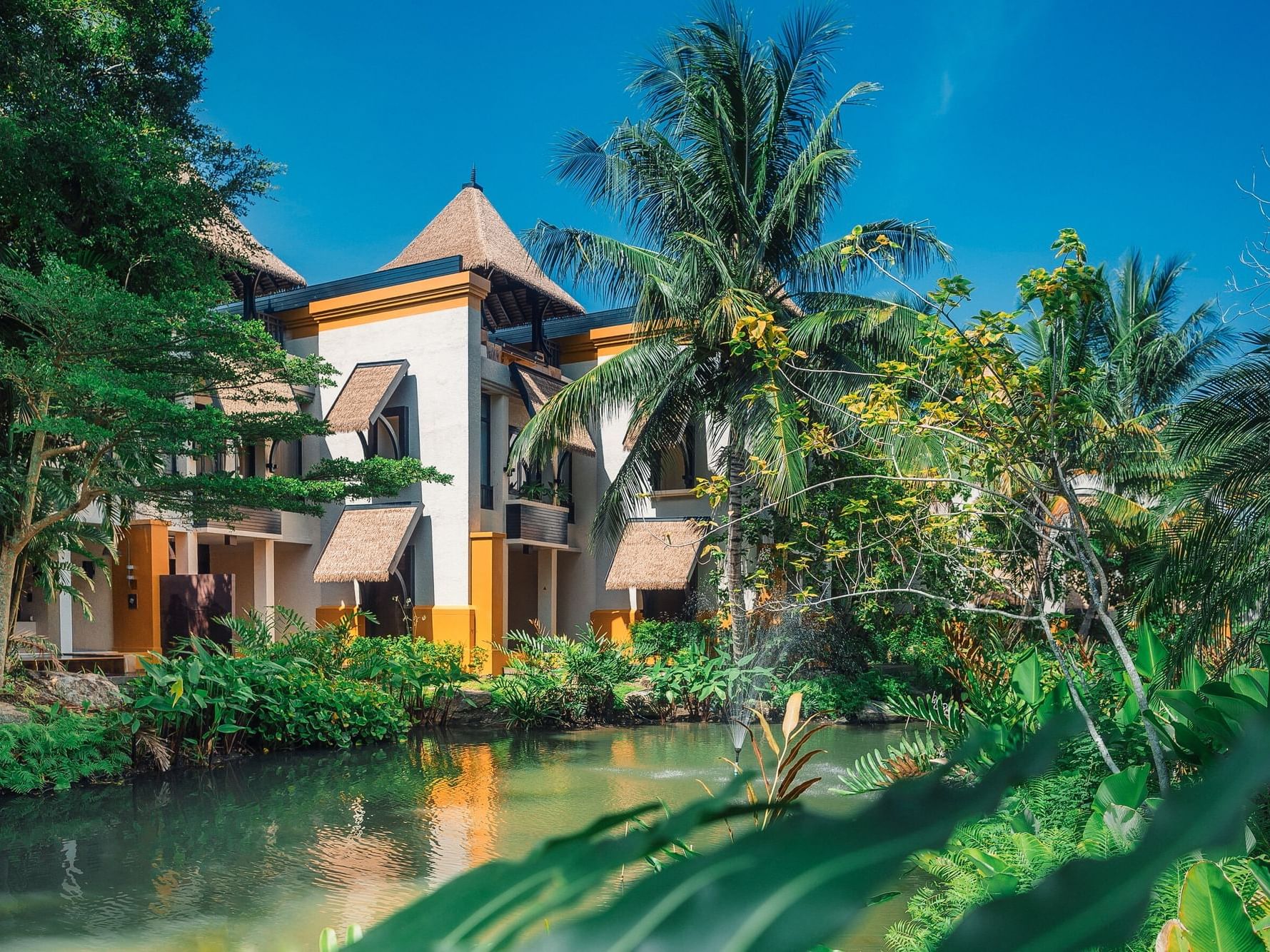 Plunge Pool Villa and Penthouse Plunge Pool Villa with the lagoon, surrounded by tropical lush garden