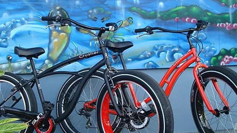 Rad Bicycles parked by a wall near Legacy Vacation Resorts