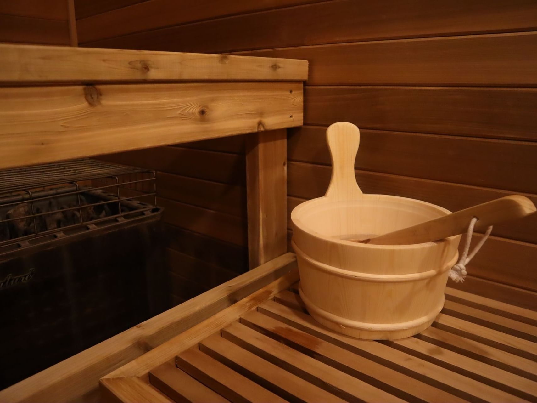 Equipment in the relaxing sauna with dim lights at Alderbrook Resort & Spa