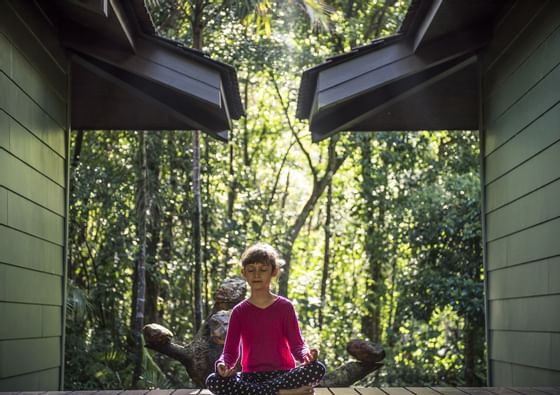 small girl in yoga pose