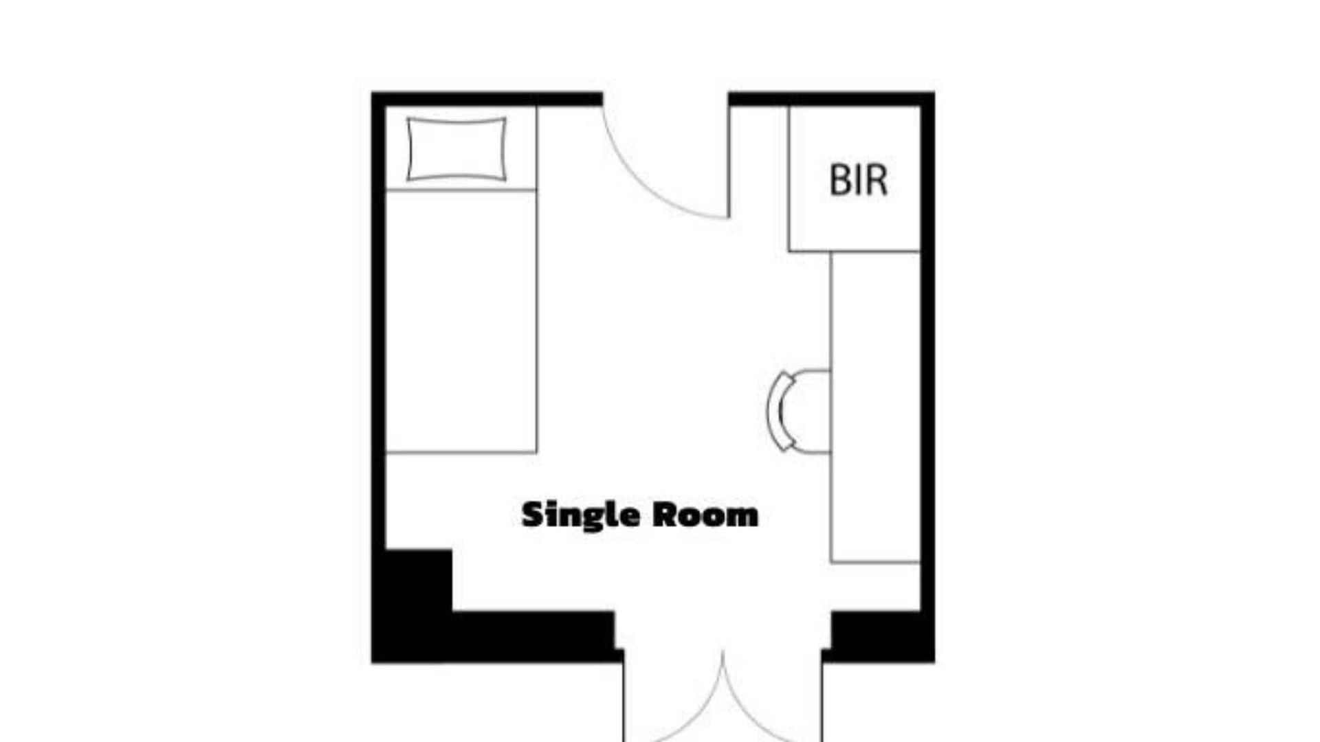 Floor plan of a single room with a bed at UniLodge Herston