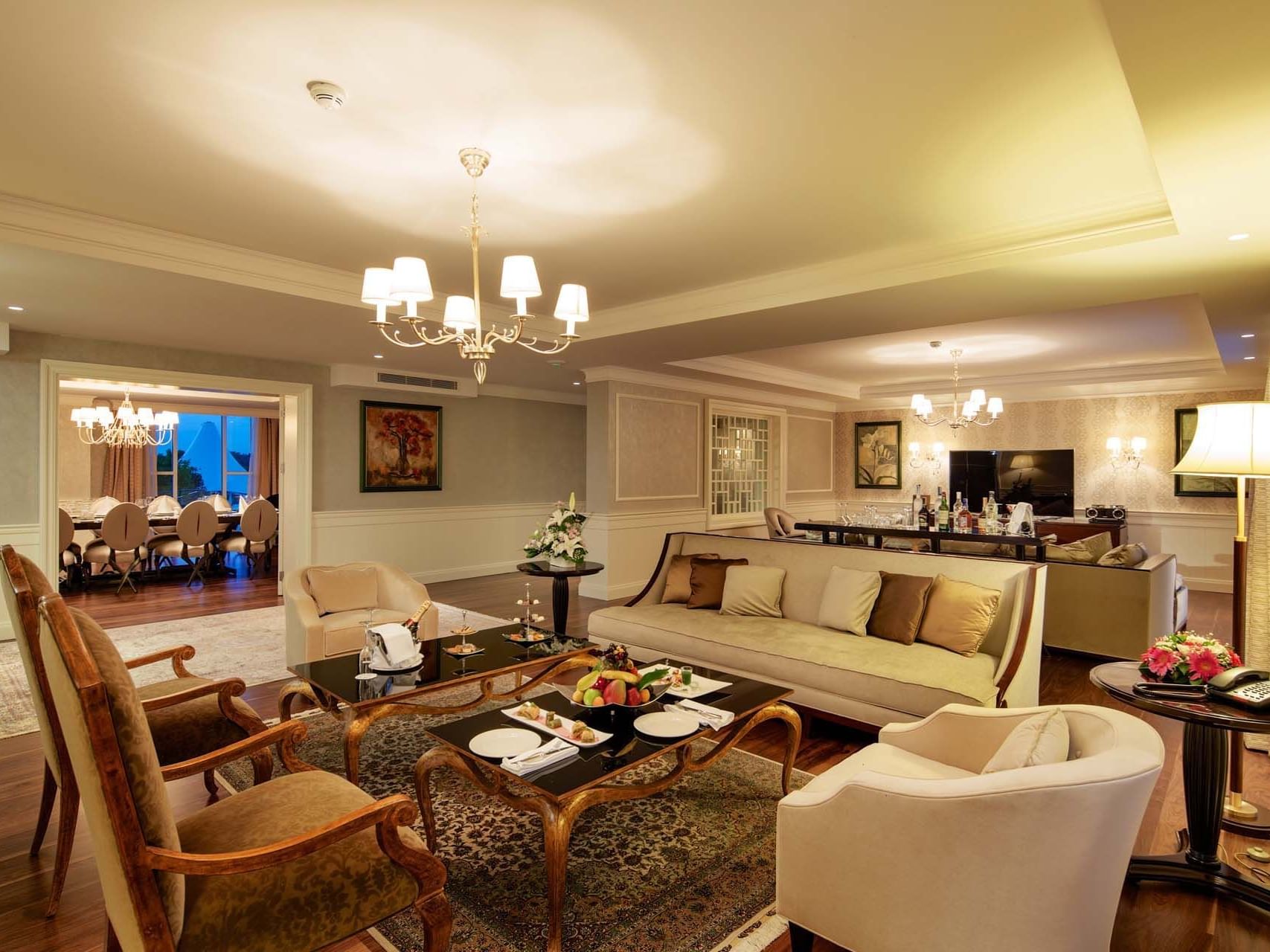 Living area with wooden floors in Presidential Villa at Titanic Deluxe Golf Belek
