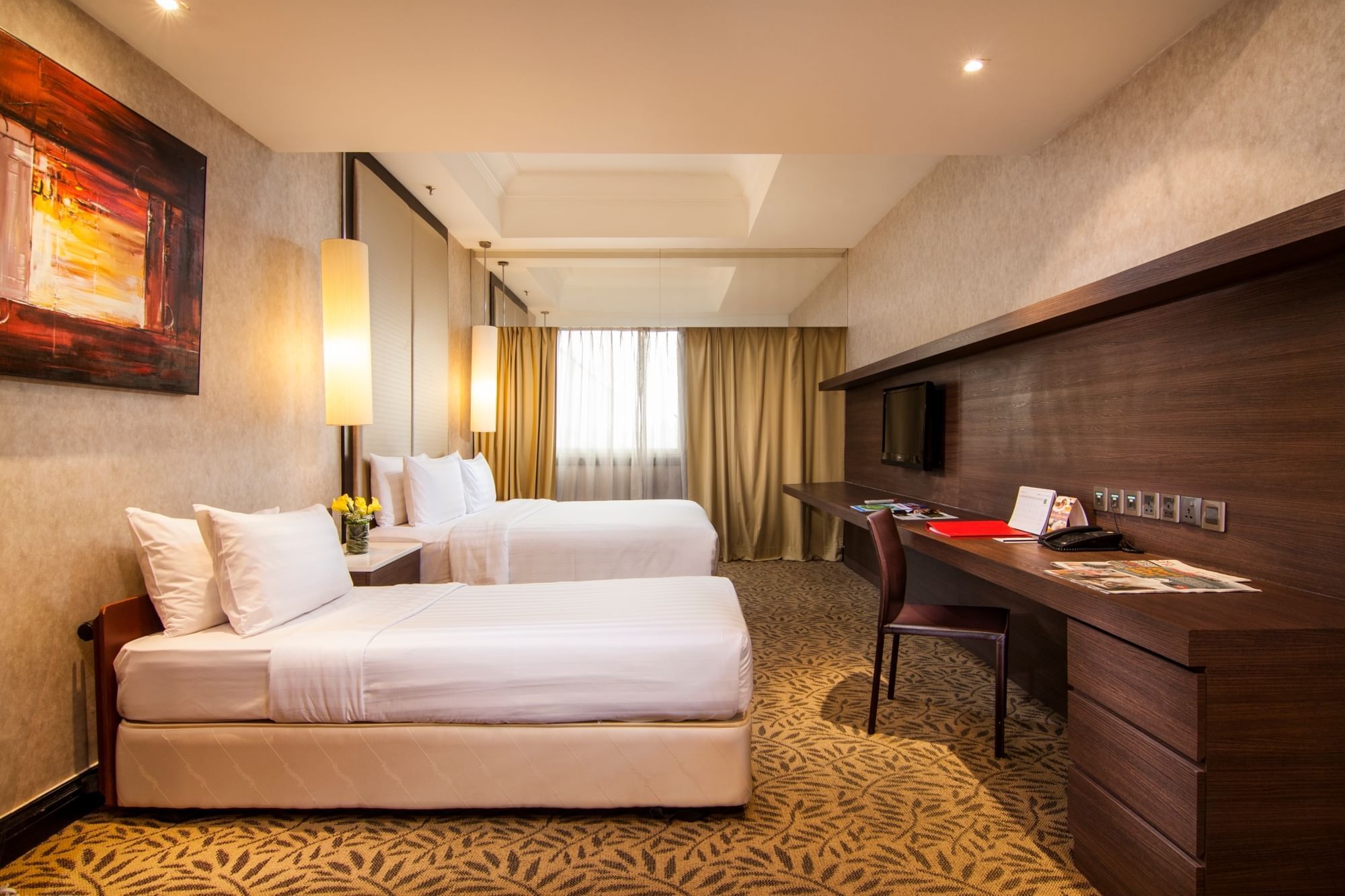 Twin beds, working desk in Family Room at Sunway Putra Hotel