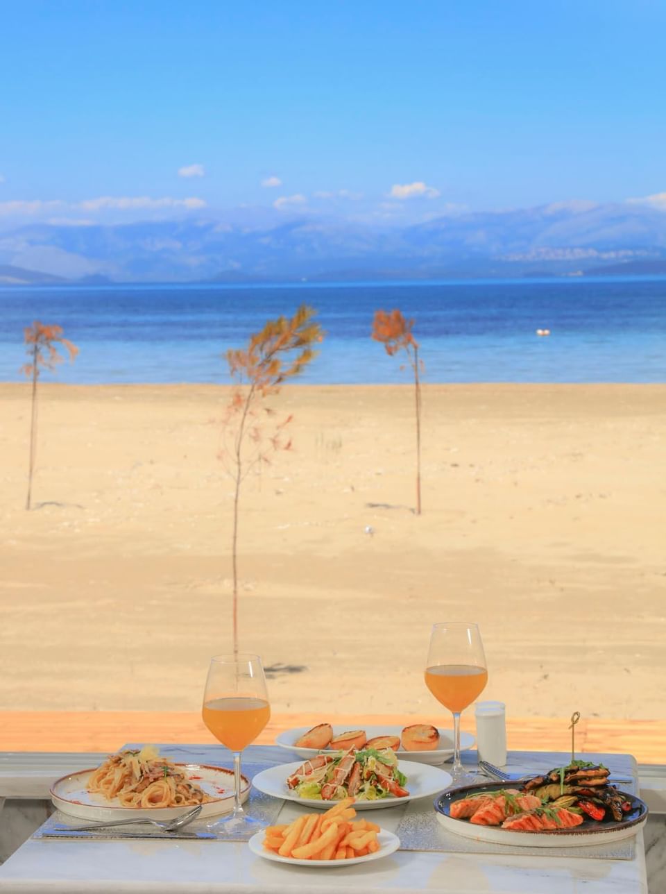 Breakfast table served in the restaurant at Cavomarina Beach hotel