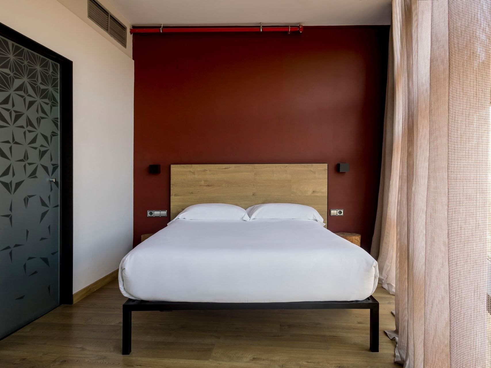 Bedroom arrangement in a room at Aparthotel Allada