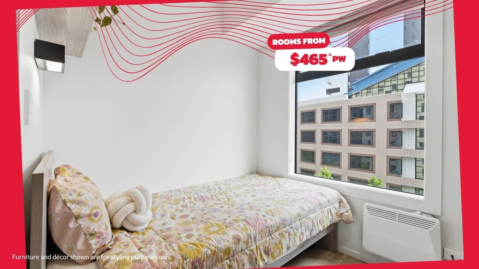 A cozy student room with a single bed, floral decor, and window at Mayoral Drive Student Accommodation.
