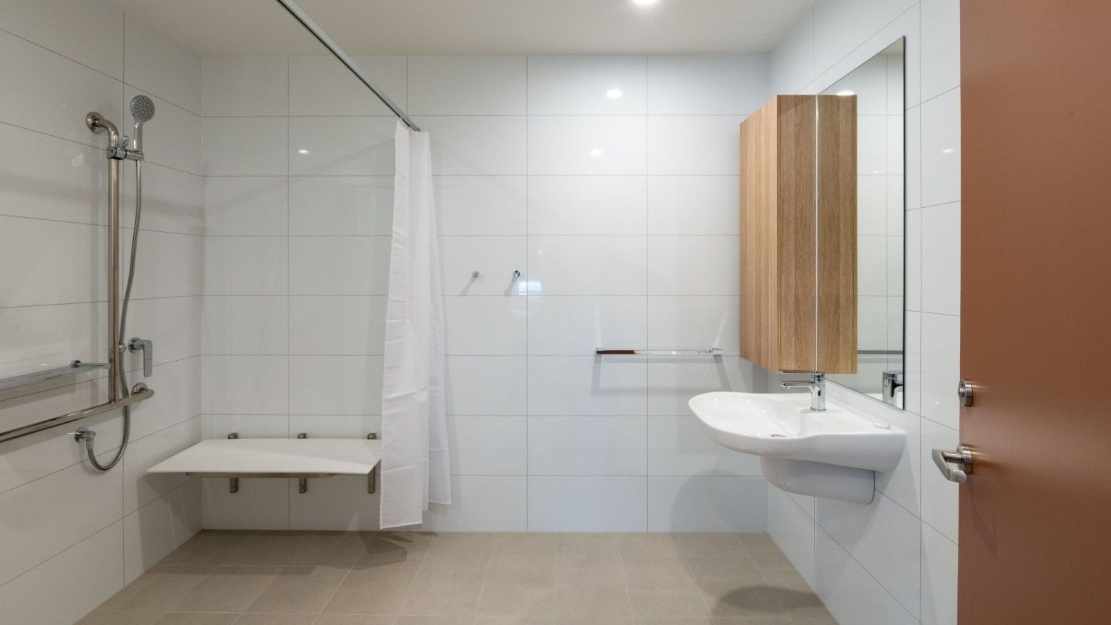 Clean and modern bathroom with shower and sink at UniLodge Brisbane City.