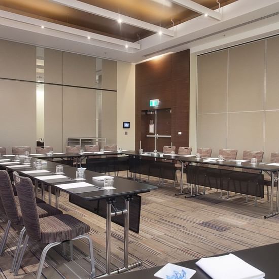 U-shaped table in a meeting space at Pullman Olympic Park