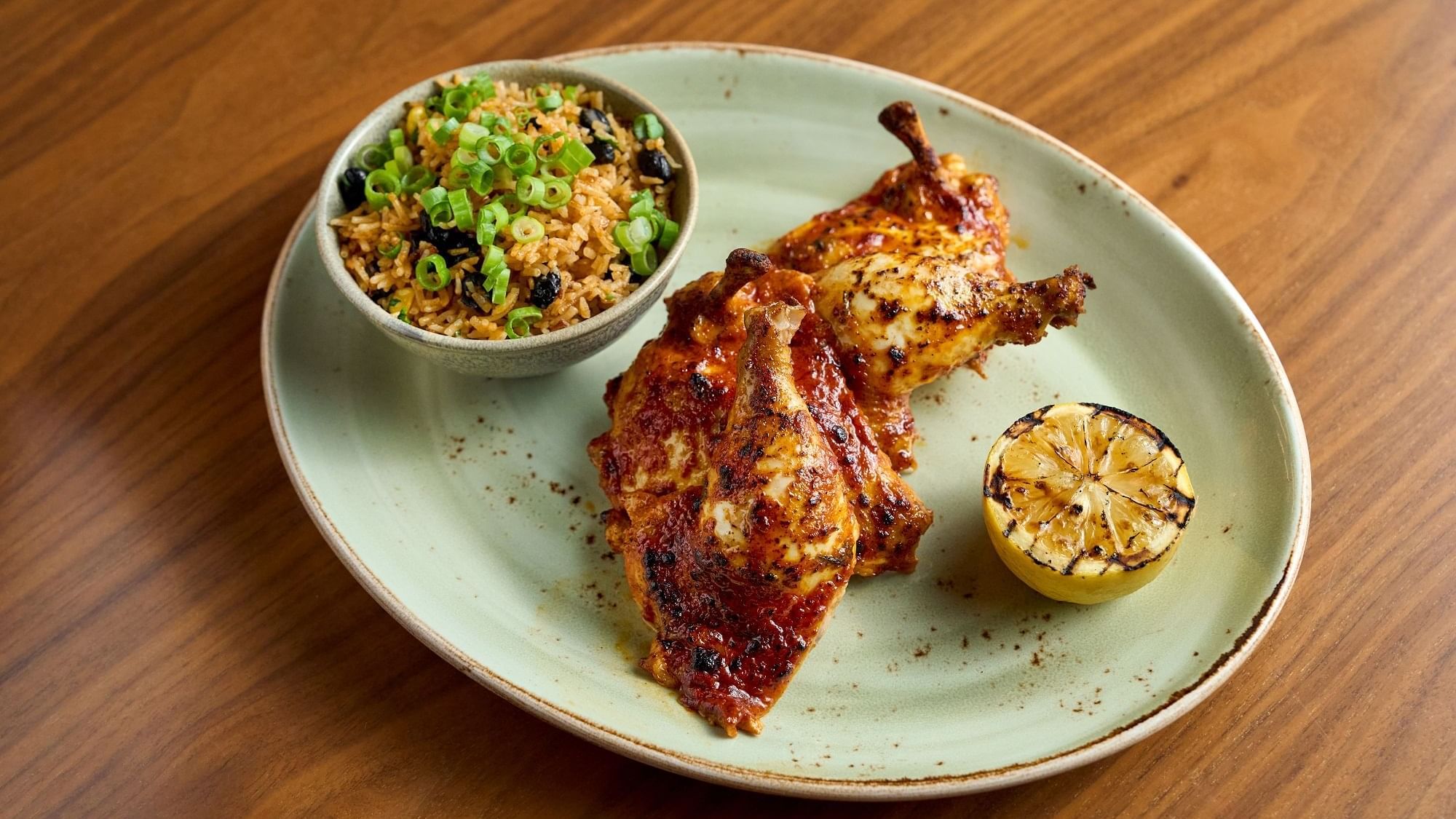 A rice cup with grilled chicken served in Pacific Groove Restaurant & Lounge at Paramount Hotel Dubai