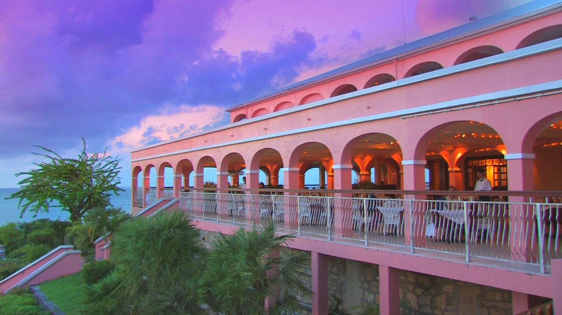 View of The Terrace restaurant in Buccaneer Hotel at sunset