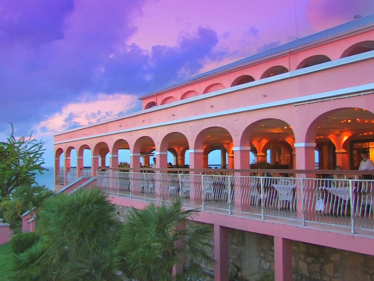 View of The Terrace restaurant in Buccaneer Hotel at sunset