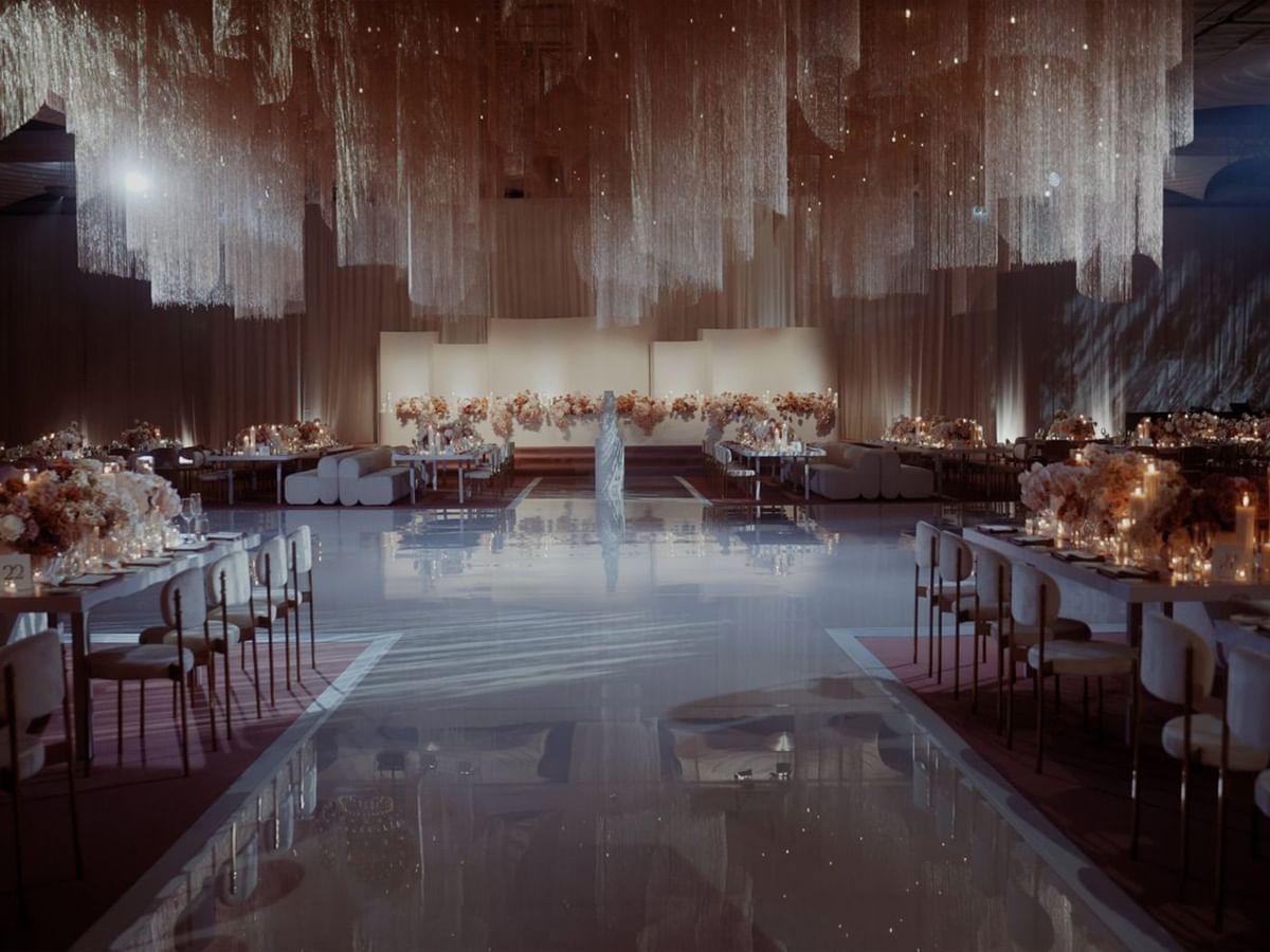 Banquet hall with floral decor for Kayla and JJ's wedding ceremony at Crown Towers Perth
