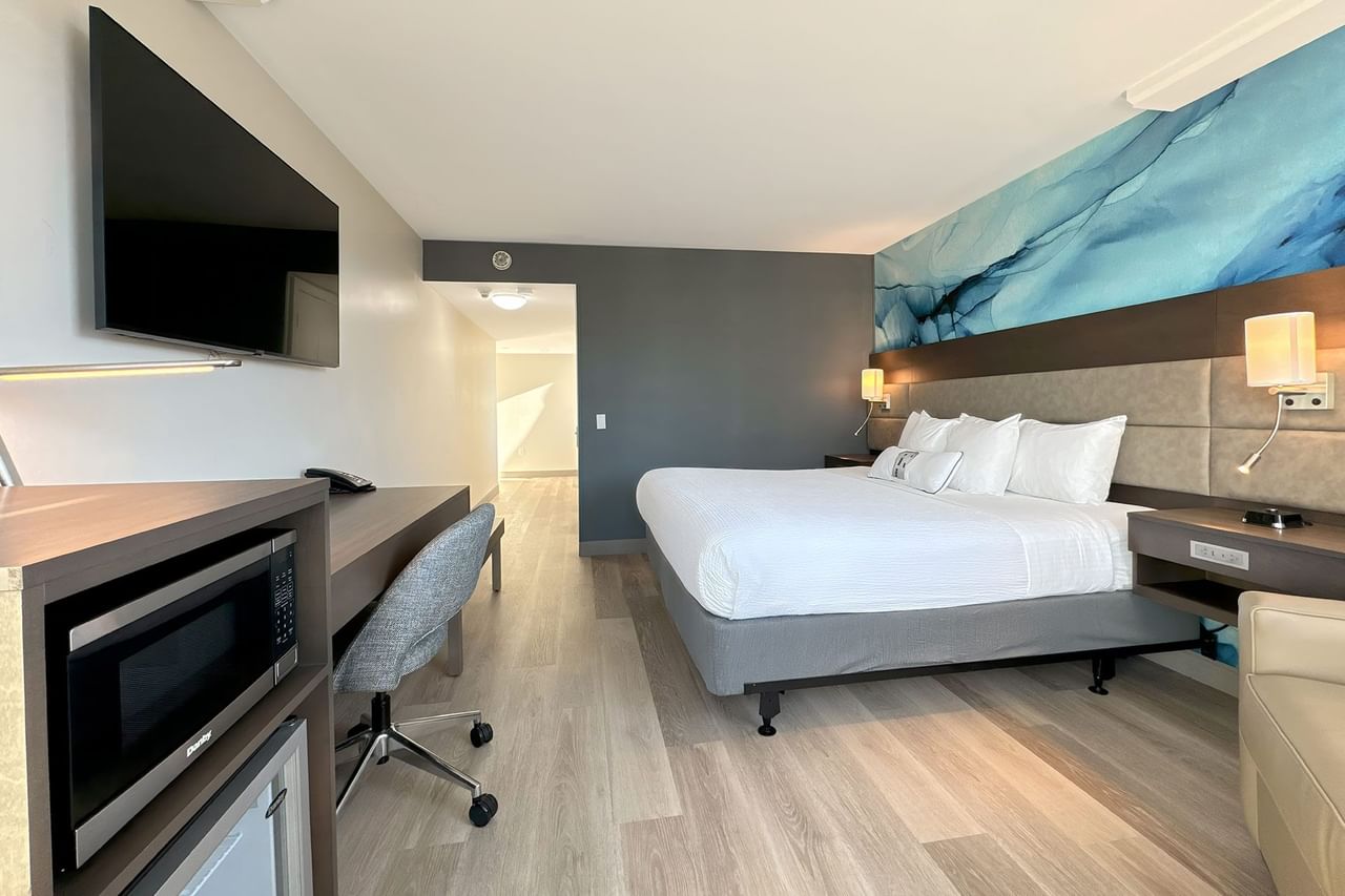 Accessible hotel guestroom with king bed and work desk