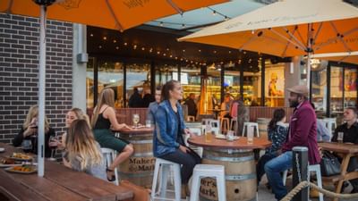 People at the outdoor dining area in Dock Bar at Knightsbridge