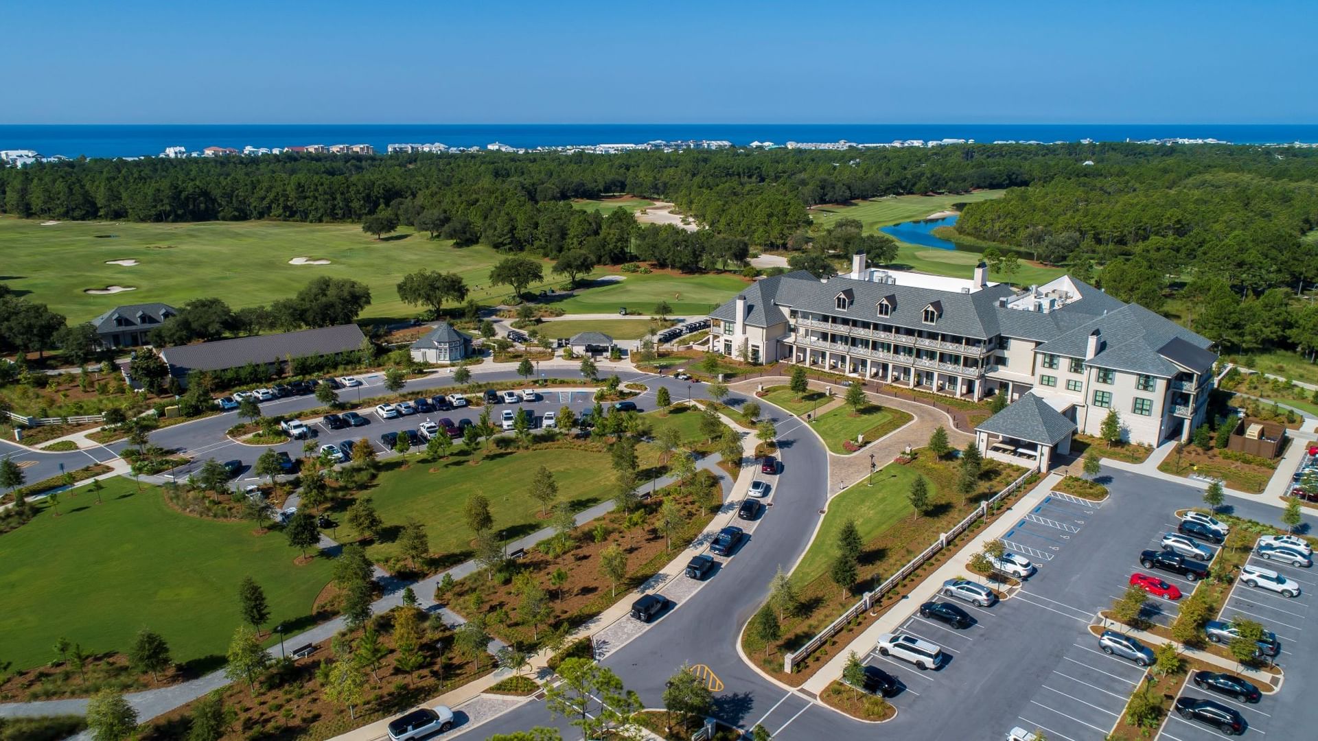 Aerial view of Camp Creek Inn with the Gulf of Mexico in the background