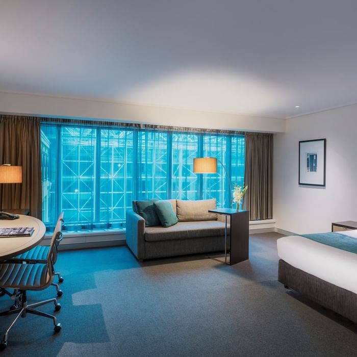 Interior of Family Suite with king bed at Novotel Melbourne