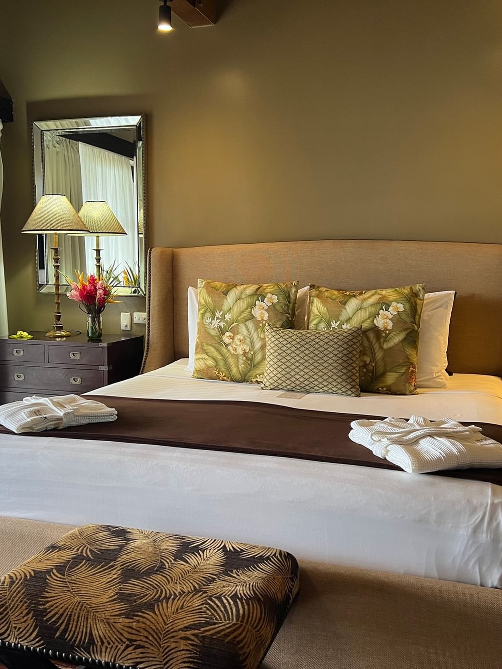 Elegant Erakor Residence bedroom at Warwick Le Lagon Efate with tropical decor and wooden floors.