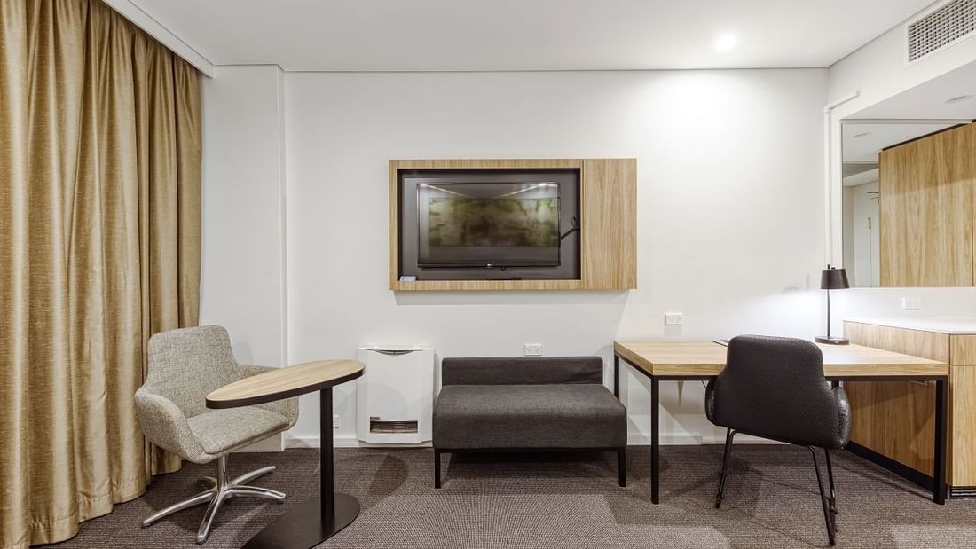 Desk, chair and couch in Superior Room at Mercure Penrith Hotel Australia
