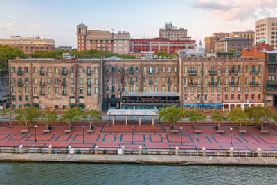 Exterior view with historic architecture and waterfront at River Street Inn