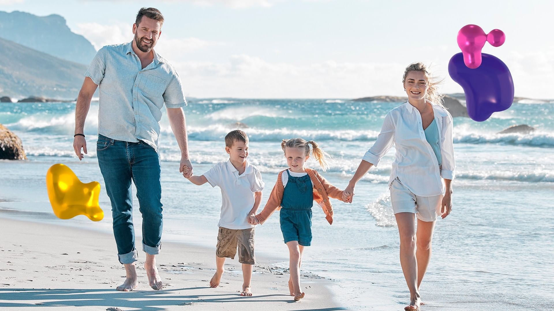 Happy family walking on the sandy beach near Quinta Real Acapulco, enjoying a sunny day by the beautiful ocean
