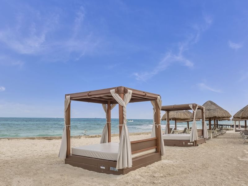 Beach cabanas by the beach at FA Hotels & Resorts